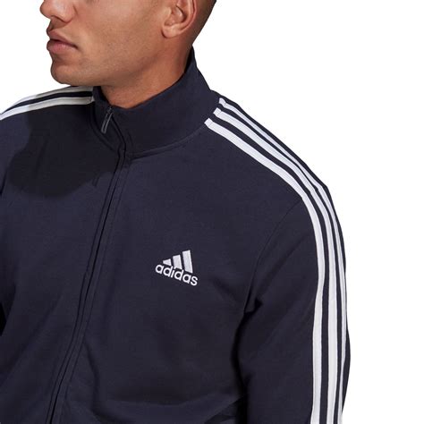 adidas three stripe tracksuit.